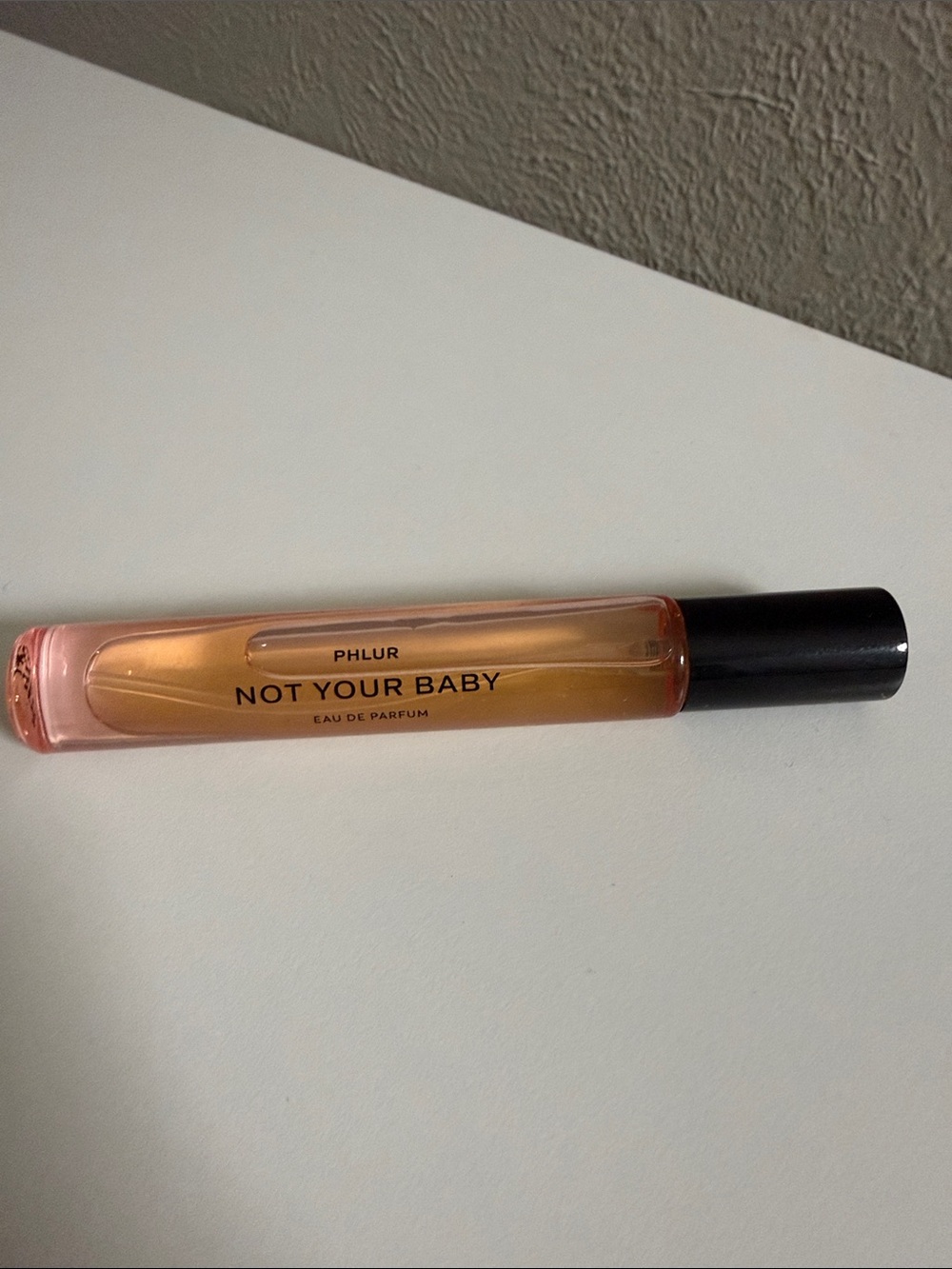 PHLUR Not Your Baby Rollerball Eau de Parfum — Amber Pink